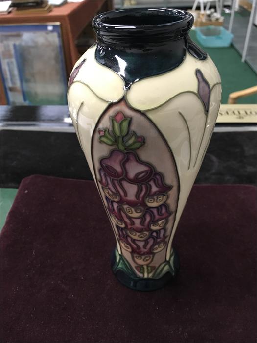 A Moorcroft Foxglove vase 8 inch. design R Bishop paint M Thomas.