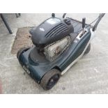 A Hayter spirit petrol garden mower.