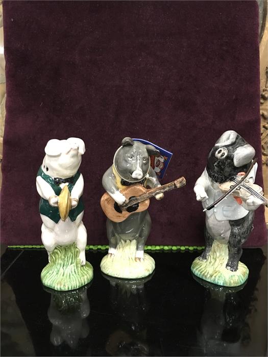 A Beswick pig band - Daniel George and Christopher.