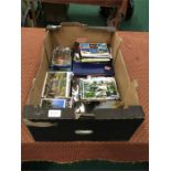A box containing a large quantity of mainly modern postcards both used and unused.