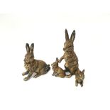 Heyde or similar lead hollowcast rabbit family, comprising two adult rabbits and two kittens. Height