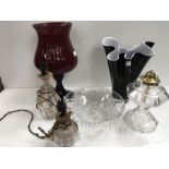 Glassware to include lamps, a vase, a bowl and a large glass.