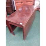 A mahogany drop leaf table.