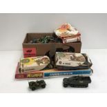 A large quantity of toy soldiers to include Britain's a Dinky German tank and a Dinky U.S jeep.