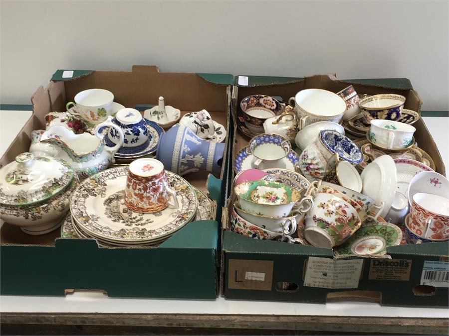 A mixed collection of tea sets.