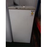 A Satrap upright freezer.