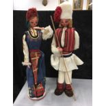 Two European dressed dolls.