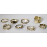 A collection of mixed silver rings.