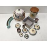 Various Poole pottery items.