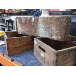 Three wooden crates depicting Sunparlor of Blandford.