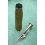 Trumpet and shell case.