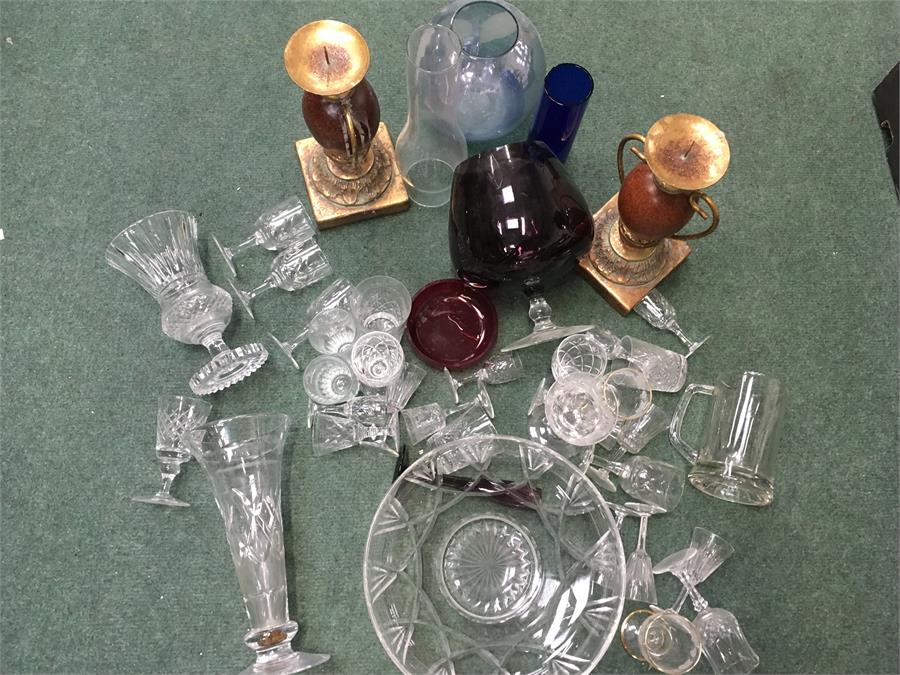 A box containing various glassware.