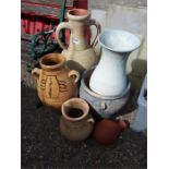 A collection of various terracotta pots and vases.