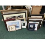 A collection of paintings and picture frames.