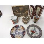 Oriental items to include plates, pictures and small dividers.