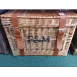 A Fortnum & Masons wicker hamper.