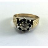 A 9 carat gold antique diamond and sapphire cluster ring, size M.