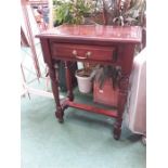 A mahogany side table with single drawer to front.