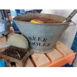 A galvanised beer cooler together with cast iron bootscrape and other items.