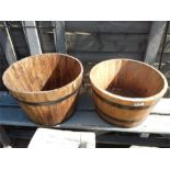 Two half barrel planters.