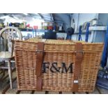 A Fortnum & Masons large wicker hamper.