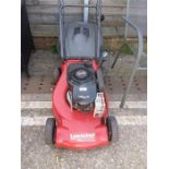 A Lawnchief 420p self propelled petrol lawn mower.