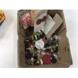 A small box of vintage buttons.