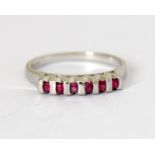 A 9 carat white gold ladies' ruby ring, size N.