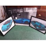 A set of three car prints.