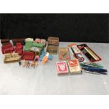 A mixed lot to include pens, playing cards, card case, doll's house furniture etc.