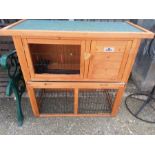 A Confidence pet rabbit hutch.