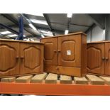 A set of three pine double wall cupboards.