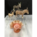 Two Beswick donkeys together with a Goebel donkey and a piece of carnival glass