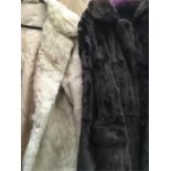 Two fur coats.