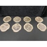 Eight Poole Pottery bird plaques (one damaged).