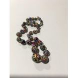 A string of vintage Millefiori glass beads.
