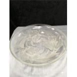 A Verlys large 13" diameter clear glass shallow bowl with orchids.