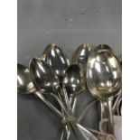 Sixteen silver and silver plated spoons.