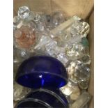 A box of glass stoppers.