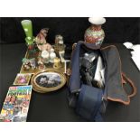 A box of various collectables to include Polaroid camera novelty glass German figures etc.