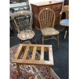 Two kitchen chairs, an oak luggage rack and a painting of a harbour scene together with a wall