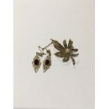 A 9ct gold Pearl set brooch together with a pair of 9ct gold Garnet set earrings. Total weight 10