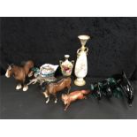 A mixed lot of china to include five Beswick animals (one damaged), three Poole Pottery Dolphins,