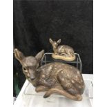 A large Poole Pottery fawn with a smaller fawn.