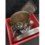 A box containing a large quantity of silver plate.