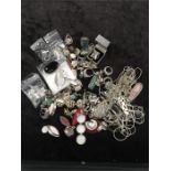 A bag of silver costume jewellery including ring and necklaces (total weight 700 grams).
