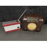 A vintage Bush 1950's Bakelite radio together with a retro Roberts radio.