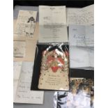 A small box of letters, signature etc.