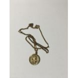 A 9ct gold St Christopher medallion and long chain. 8.6 grams.