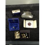 A collection of cuff links and shirt studs together with a silver plated purse and a travelling